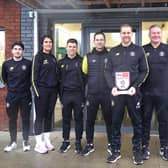 Harrogate Town Manager Simon Weaver and his backroom team with the League Two Manager of the Month award. Pictures: Submitted