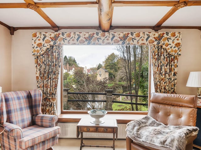 A quiet spot in the property by a picture window.