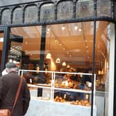 Tasteful and stylish - Cornish Bakery kept the building's original cast iron canopy in its natural black colour as part of a sophisticated conversion on James Street in Harrogate. (Picture contributed)