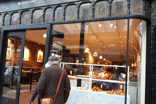 Tasteful and stylish - Cornish Bakery kept the building's original cast iron canopy in its natural black colour as part of a sophisticated conversion on James Street in Harrogate. (Picture contributed)