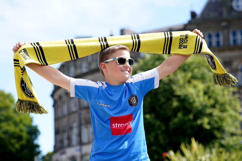 Fans lined the streets of Harrogate during the open-top bus parade to celebrate the club's promotion to the English Football League