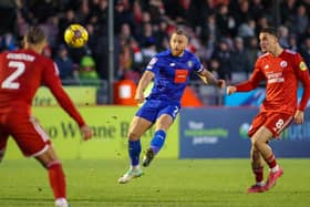 George Thomson takes aim at goal during Harrogate Town's League Two defeat at Crawley. Pictures: Matt Kirkham