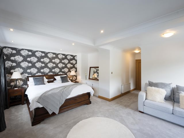 Another of the property's six double bedrooms.