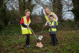 Success for Harrogate village schools - Keeping the school environment green and clean are pupils Kelsey and Dennis Haighton with executive headteacher Victoria Kirkman. (Picture contributed)
