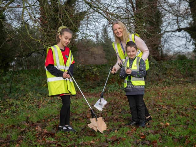 Success for Harrogate village schools - Keeping the school environment green and clean are pupils Kelsey and Dennis Haighton with executive headteacher Victoria Kirkman. (Picture contributed)
