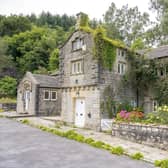 The stone country house is surrounded by stunning gardens, woodland and countryside.