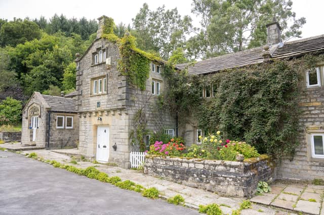 The stone country house is surrounded by stunning gardens, woodland and countryside.