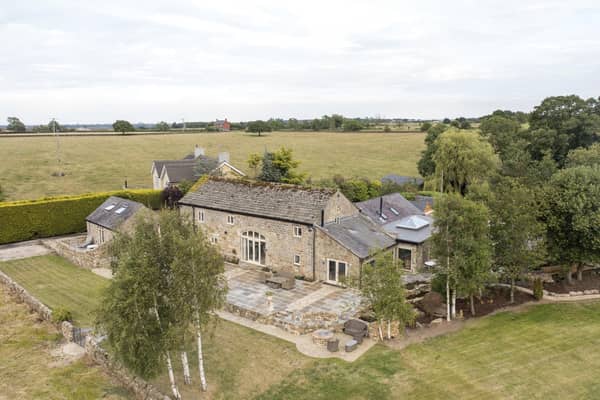 This impressive barn conversion has a price tag of £2,250,000.
