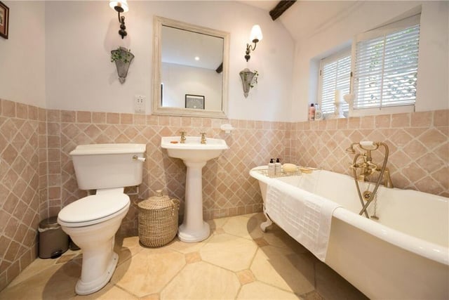 One of three bathrooms in the property.