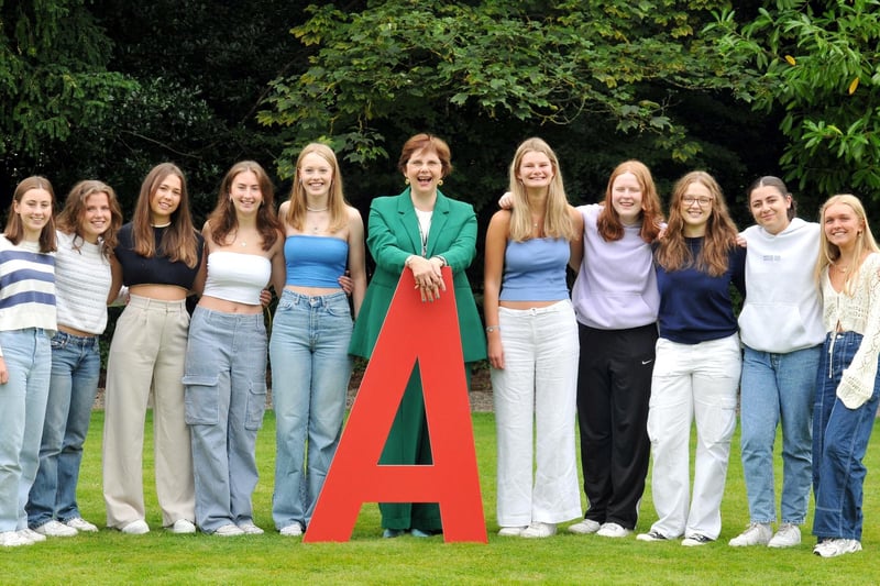 Principle of Harrogate Ladies' College, Mrs Sylvia Brett, celebrating with pupils after receiving a fantastic set of A-level results