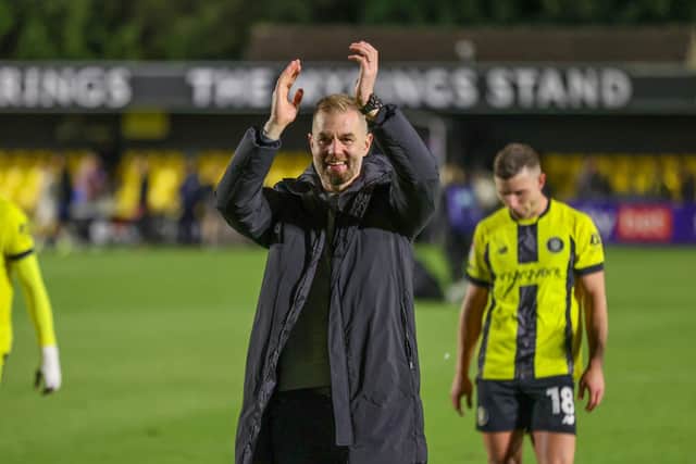 Harrogate Town manager Simon Weaver enjoys his side's 2-0 victory over Doncaster Rovers.