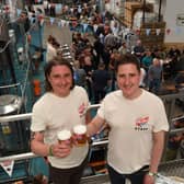 Cheers! Tom Fozard, Commercial Director of Rooster’s Brewing Co and Oliver Fozard Head Brewer at Suds With Buds Beer Festival. (Picture Gerard Binks)