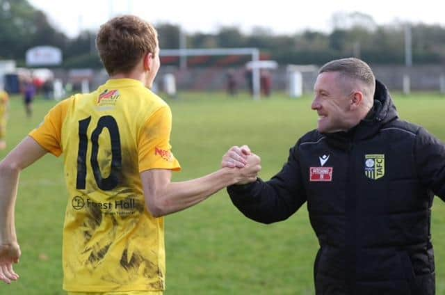 Brewers boss Mick O'Connell, right, celebrates with Joe Crosby.