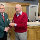Oakdale GC Club Captain Jamie Letts presents the Golfer of the Year trophy to Tony Doveston. Picture: Submitted