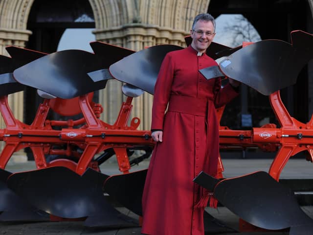 The Very Reverend John Dobson, Dean of Ripon, with plough outside Ripon Cathedral
Picture Gerard Binks