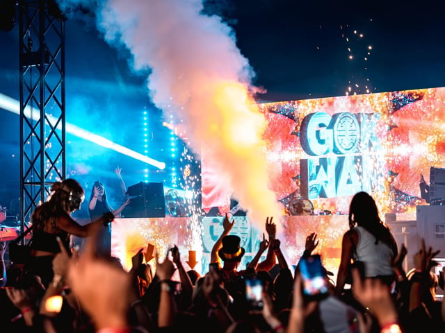 Festivalgoers enjoying Gok Wan's high-energy house music set and the vibrant atmosphere at the festival on the Stray in Harrogate