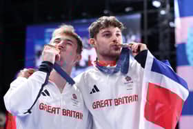 Bronze medallists Jack Laugher, left, and Anthony Harding of Team Great Britain pose following the diving medal ceremony after the men's synchronised 3m springboard final on day seven of the Olympic Games Paris 2024 at the Aquatics Centre. Photo by Quinn Rooney/Getty Images