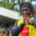 Harrogate Town forward Abraham Odoh celebrates after netting a late winner against Salford City. Pictures: Matt Kirkham
