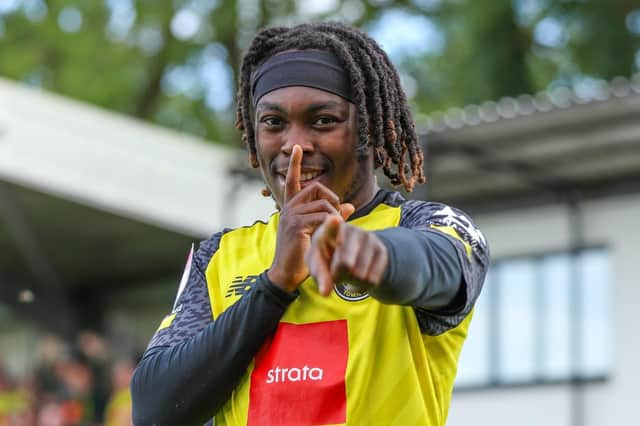 Harrogate Town forward Abraham Odoh celebrates after netting a late winner against Salford City. Pictures: Matt Kirkham