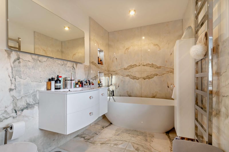 One of two luxurious, contemporary bathrooms.