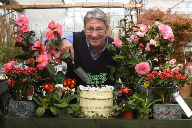 Alan Titchmarsh, gardener, broadcaster, TV presenter and patron of Horticap, cutting the 40th birthday cake