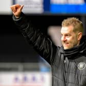 Simon Weaver acknowledges the Harrogate Town faithful following Boxing Day's dramatic League Two win over Grimsby Town. Pictures: Ben Roberts/ProSportsImages