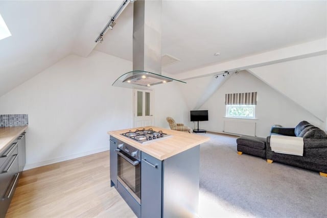 Kitchen and living space within the apartment.