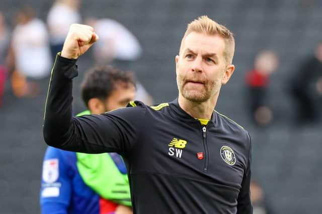 Simon Weaver celebrates his side's 1-0 success at MK Dons.