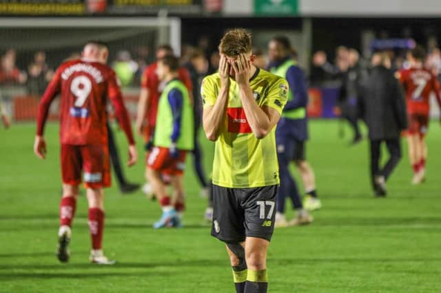 Harrogate Town midfielder Josh Austerfield cannot hide his disappointment after Harrogate Town were stung late on by Carlisle United. Picture: Matt Kirkham