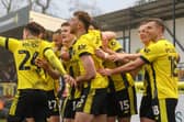 Harrogate Town players celebrate Jasper Moon's 53rd-minute opener during Saturday's home win over Swindon. Pictures: Matt Kirkham