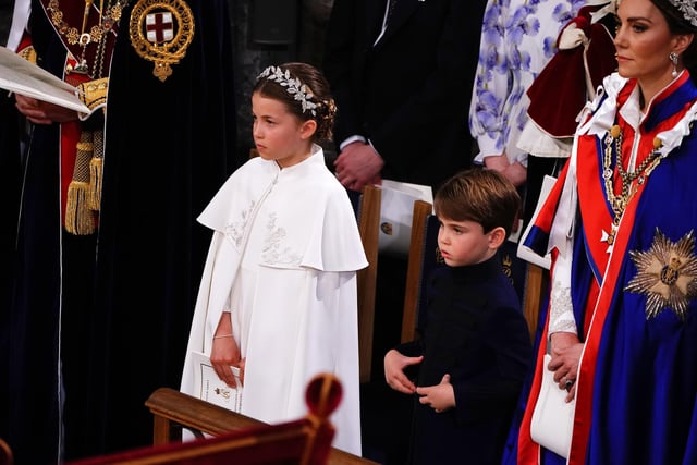 Princess Charlotte, Prince Louis and Catherine, Princess of Wales at the coronation ceremony of King Charles III and Queen Camilla in Westminster Abbey.