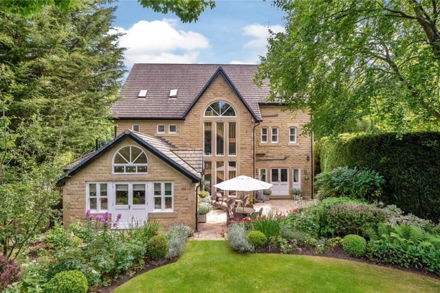 Looking back at the impressive property from the rear garden.