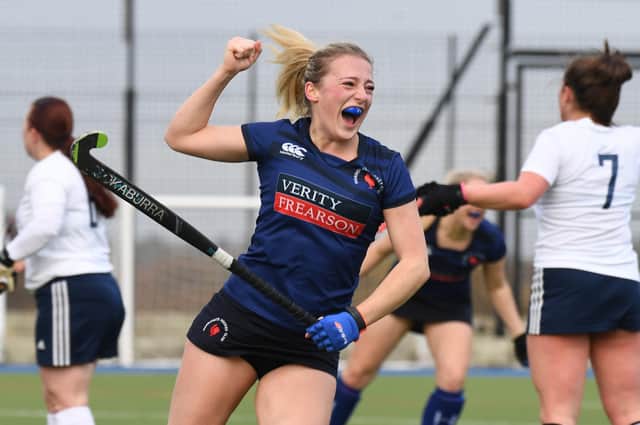 Holly Oldham celebrates after completing her hat-trick during Harrogate Hockey Club Ladies 1s' home win over Fylde. Pictures: Gerard Binks