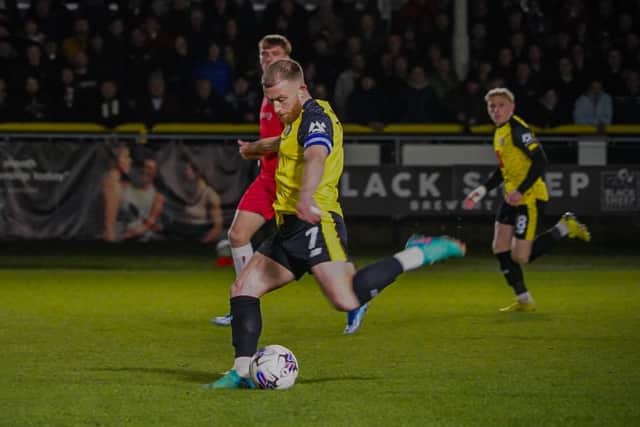 George Thomson takes aim at goal during Tuesday night's League Two win over Grimsby Town. Picture: Brody Pattison