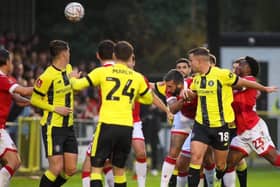 Jack Muldoon heads Harrogate Town into a 24th-minute lead against Wrexham at Wetherby Road. Pictures: Matt Kirkham