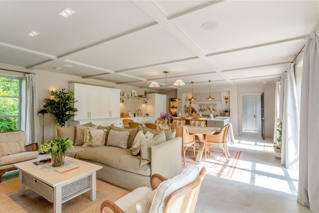 Dining and snug areas within the open plan arrangement.