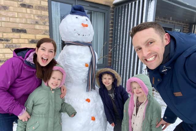 Mr Nathan Sadler, Headteacher at Belmont Grosvenor School in Harrogate, his wife and their three children enjoying a snow day