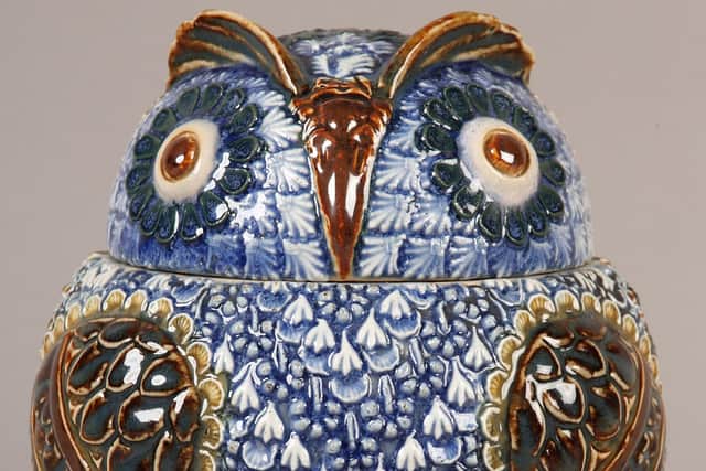 A Doulton Lambeth owl tobacco jar.