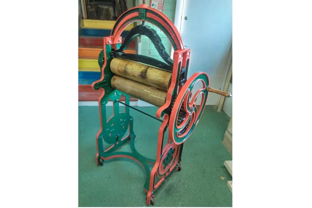 The Men's Shed has refurbished an antique washing mangle for the Nidderdale Museum.
