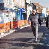 Councillor Andrew Williams (left) and Councillor Keane Duncan assessing the final stage of the resurfacing and lining work on the roads around Ripon Market Place