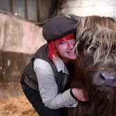 Dumble Farm owner Fiona Wilson is no stranger to cows and is delighted with the success of her 'cuddle a cow' experience which is drawing in new visitors.

