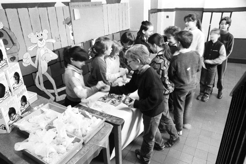 Children at Sciennes primary school tuck shop queue for sweets and crisps in March 1987.