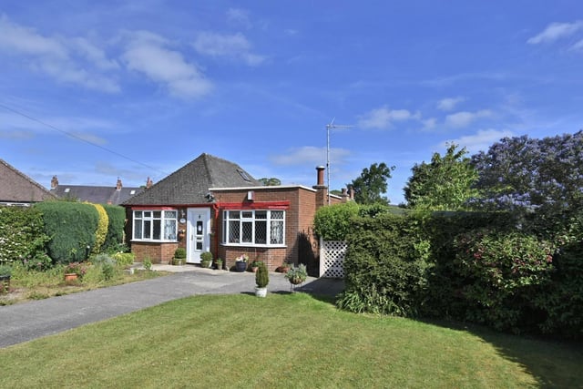 A two bedroom detached bungalow with a large private garden and opportunity for development is for sale with Solo Property Management at the guide price of £349,950