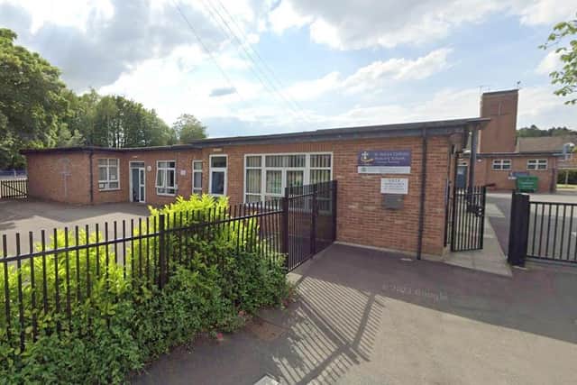 A child was taken to hospital after being bitten by a dog outside St Mary's Catholic Primary School in Knaresborough