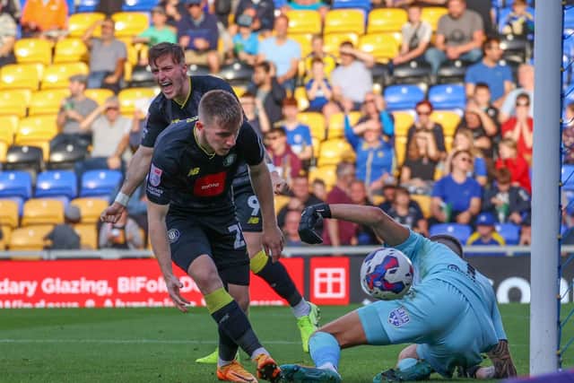 Matty Daly's second-half equaliser at AFC Wimbledon arrived after Harrogate Town kept possession of the ball from more than a minute.