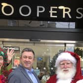 Taking part in the Harrogate Advent Calendar - The team at Hoopers department store on James Street with Santa and his elf.