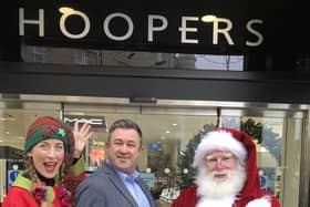 Taking part in the Harrogate Advent Calendar - The team at Hoopers department store on James Street with Santa and his elf.