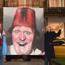 Looking forward to Charity Love Ball at Rudding Park in Harrogate - Organiser Alice Maguire with MC Simon Cotton who will be helping to raise money in aid of Martin House Children’s Hospice with the help of Temper's portrait of Tommy Cooper. (Picture Gerard Binks)