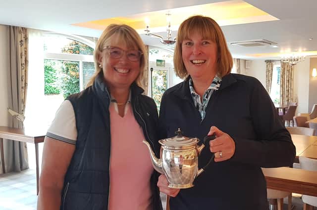 Pannal GC's 2023 Ladies Club Champion Julie Parry receives the championship trophy from Ladies Captain Clare Davies. Pictures: Submitted