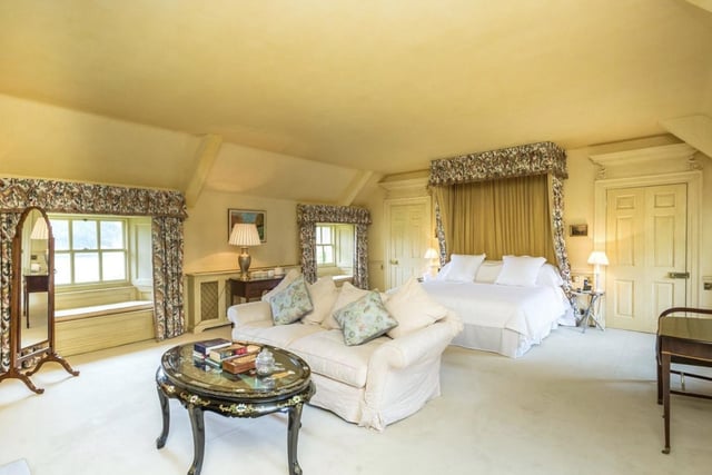 The property boasts six reception rooms and eight bedrooms in total with ornate period features throughout.